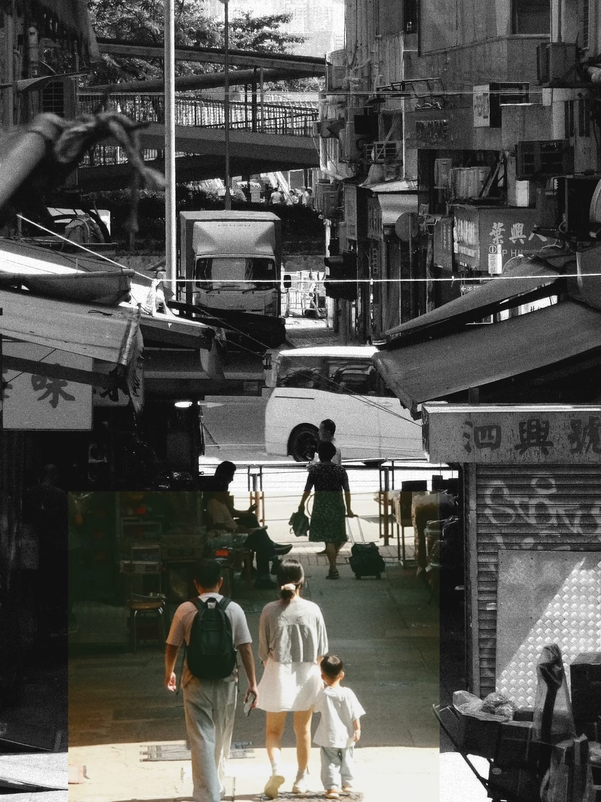 A family walking away down a market street, in black and white with a panel left in colour